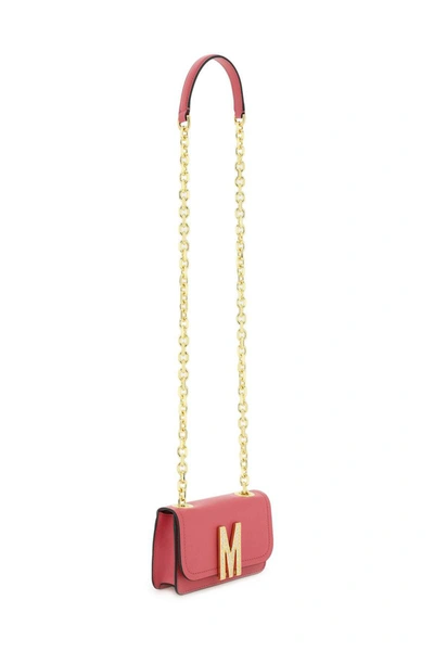 Shop Moschino Leather Mini Crossbody Bag In Fuchsia