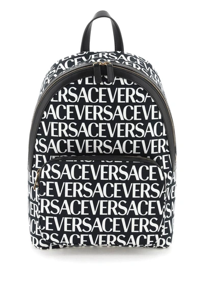 Shop Versace All-over Logo Backpack In Multicolor