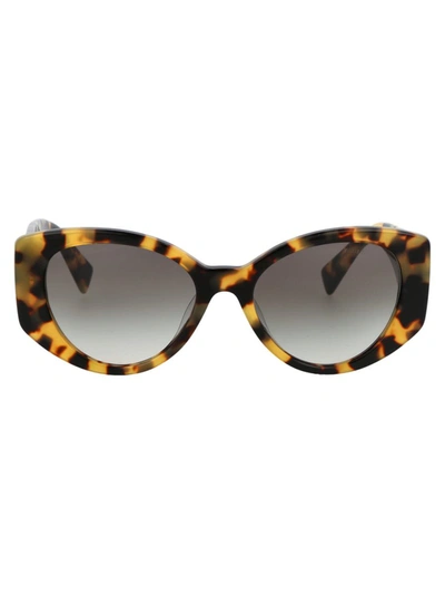 Shop Miu Miu Sunglasses In 7s00a7 Light Havana