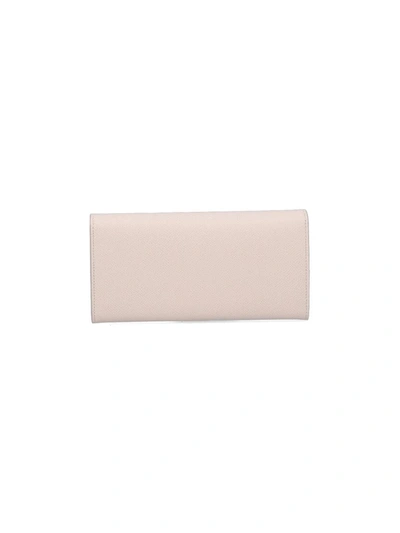 Shop Ferragamo Wallets In White
