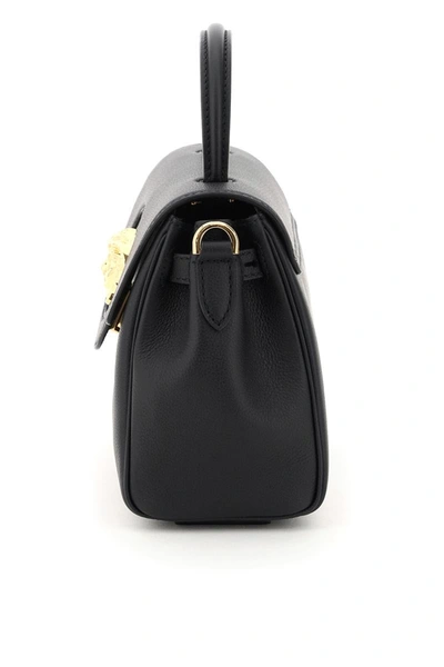 Shop Versace La Medusa Mini Handbag In Black
