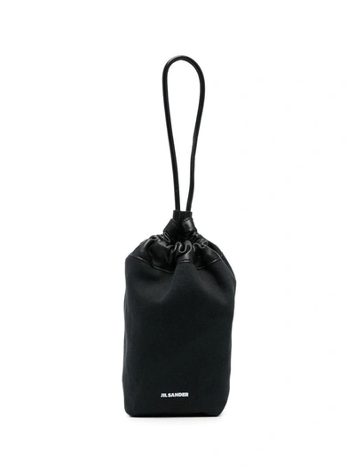 Shop Jil Sander Logo Print Clutch Bag In Black