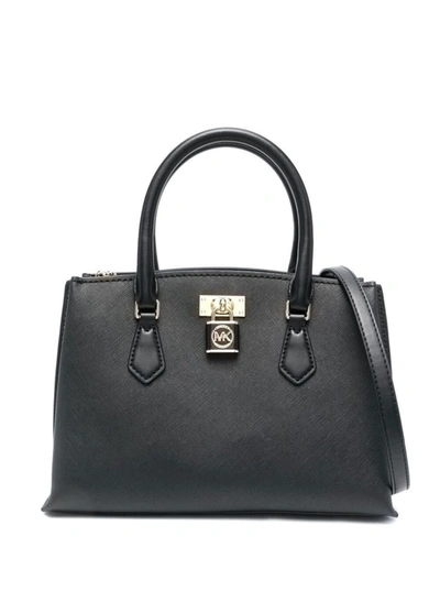Shop Michael Michael Kors Black Ruby Tote Bag With Lock Detailing  In Leather Woman