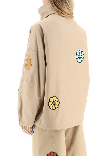 Shop Moncler Genius Moncler X Jwanderson 'delamont' Down Jacket With Macrame Flowers In Beige