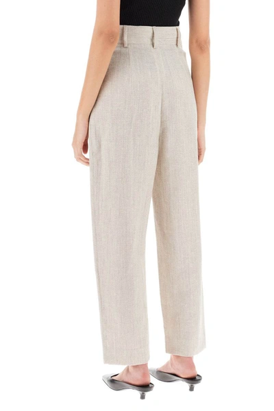 Shop Totême Toteme Tapered Pants With Mélange Finish In Beige