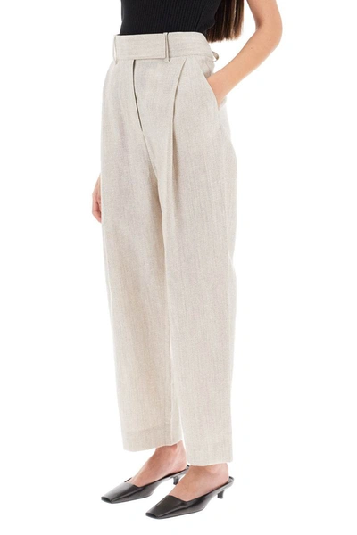 Shop Totême Toteme Tapered Pants With Mélange Finish In Beige