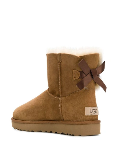 Shop Ugg Mini Bailey Bow Ii Ankle Boots In Beige