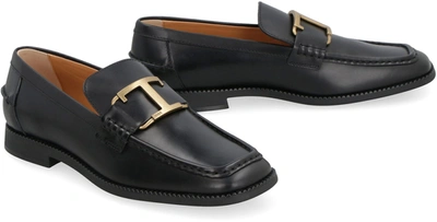 Shop Tod's Logo Detail Leather Loafers In Black