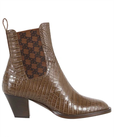 Shop Fendi Karligraphy Leather Ankle Boots In Brown