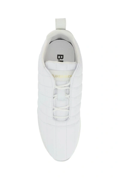 Shop Burberry Quilted Leather Sneakers In White