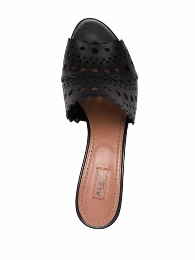 Shop Alaïa Mule Vienna In Black