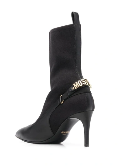 Shop Moschino Couture Boots In Black