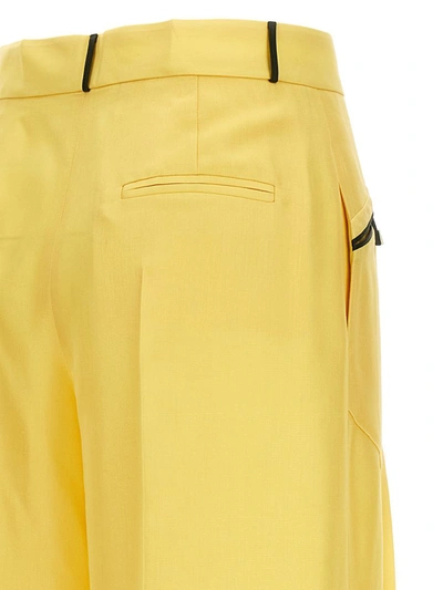 Shop Bally Contrast Piping Pants In Yellow