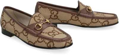 Shop Gucci Maxi Gg Fabric Loafers In Beige