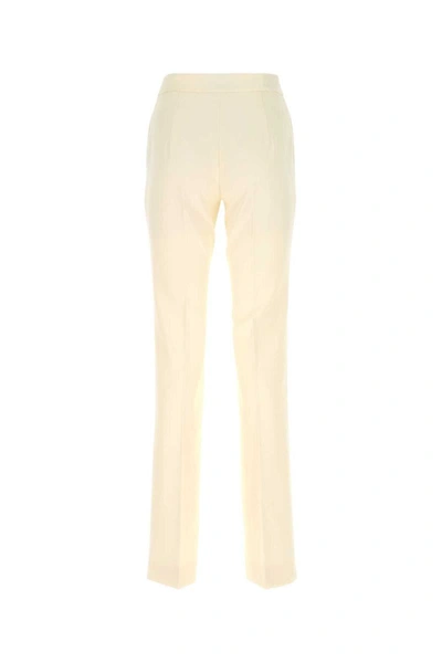 Shop Moschino Pants In Yellow