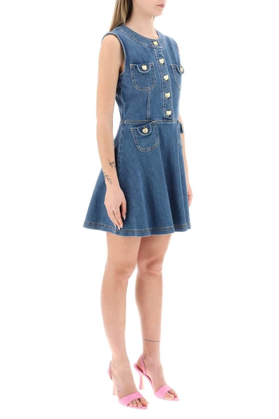 Shop Moschino Denim Mini Dress With Teddy Buttons In Blue