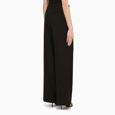 Shop Burberry Wide Trousers In Black