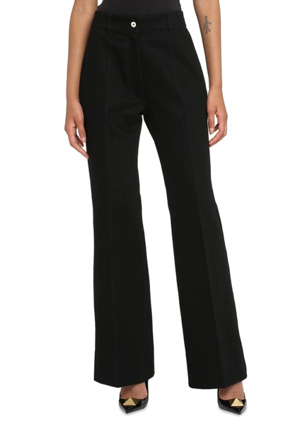 Shop Patou High-rise Flared Jeans In Black