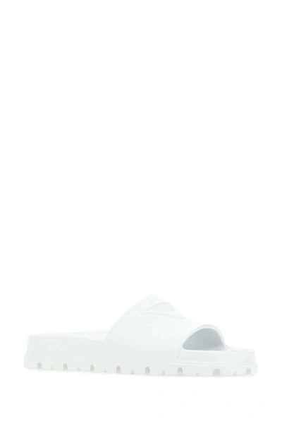 Shop Prada Slippers In White