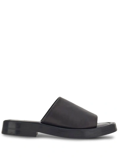 Shop Ferragamo Leather Flat Sandals In Black