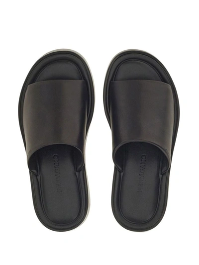 Shop Ferragamo Leather Flat Sandals In Black