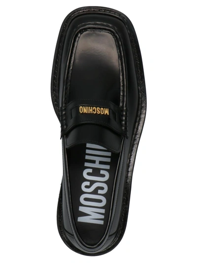 Shop Moschino Abrasive Leather Loafers In Black