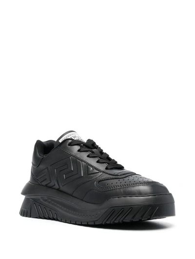 Shop Versace Odissea Leather Sneakers In Black
