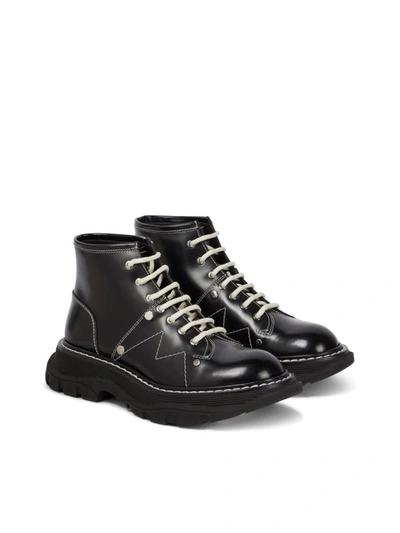 Shop Alexander Mcqueen Tread Lace-up Boots In Black