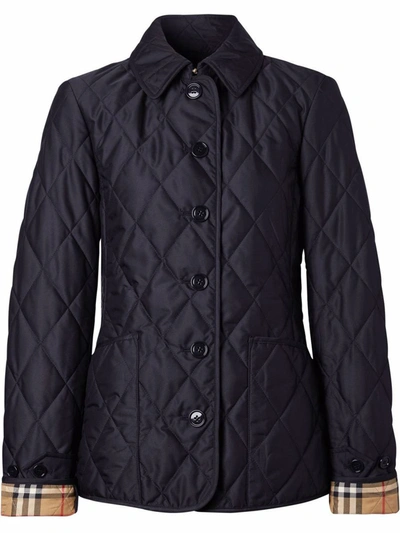 Shop Burberry Check Motif Quilted Jacket In Blue