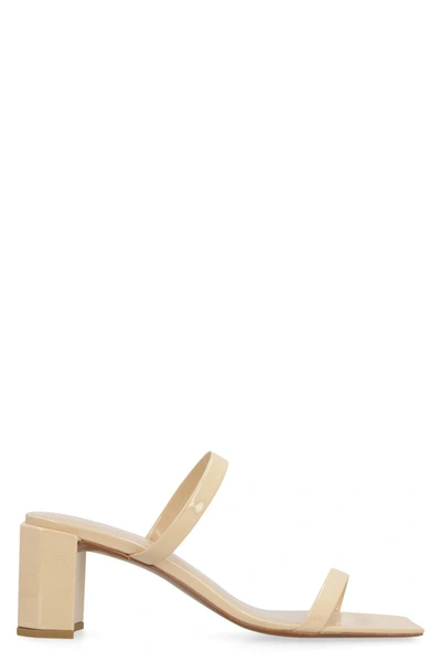 Shop By Far Tanya Kraft Patent Leather Mules In Beige