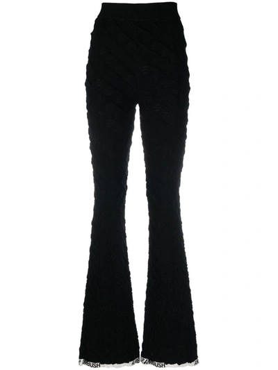 Shop Ambush High Waist Flared Knit Trousers In Black