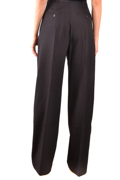 Shop Burberry Trousers In Black