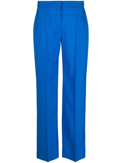 Shop Alexander Mcqueen Pants Clothing In Blue