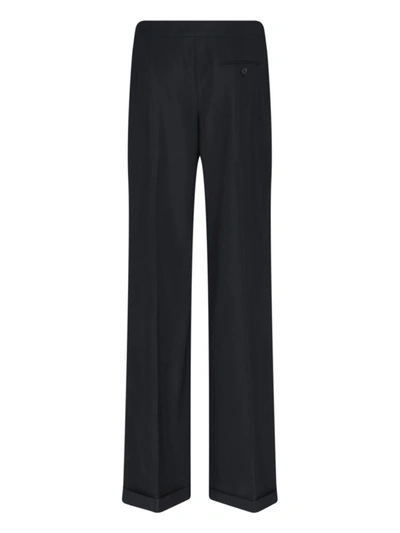 Shop Alexander Mcqueen Trousers In Black