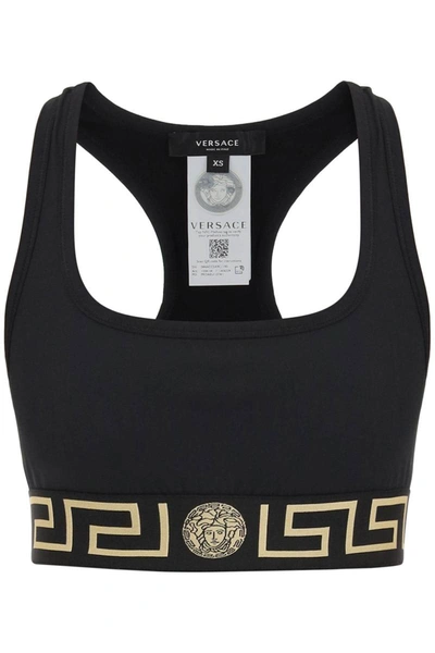 Shop Versace Sports Bra With Greca Band In Black