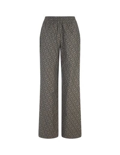 Shop Gcds Trousers With Monogram Motif In Green
