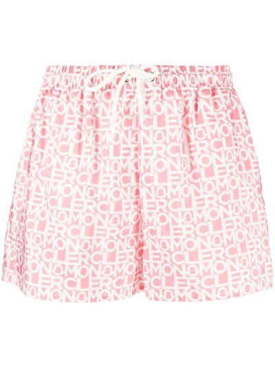 Shop Moncler Logo-print Shorts In <p>pink, White Logo-print Shorts From  Featuring Pink, White, All-over Graphic Print, Elastic