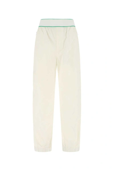 Shop Bottega Veneta Pants In White