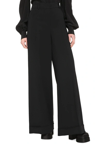 Shop Moschino High-waist Wide-leg Trousers In Black