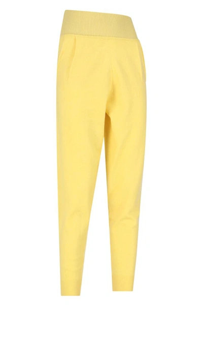 Shop Art Essay Trousers In Yellow