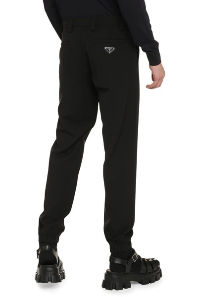 Shop Prada Wool Trousers In Black