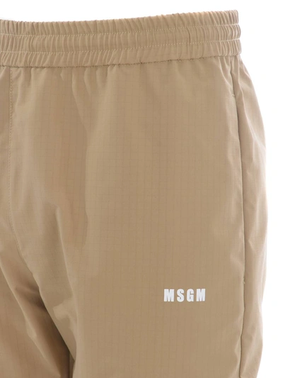 Shop Msgm Trousers In Beige
