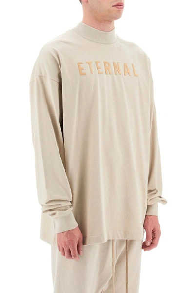 Shop Fear Of God 'eternal' Long-sleeved T-shirt In Beige