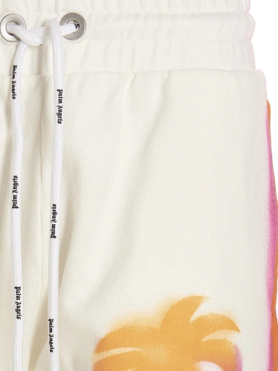 Shop Palm Angels 'sprayed Palm' Joggers In White