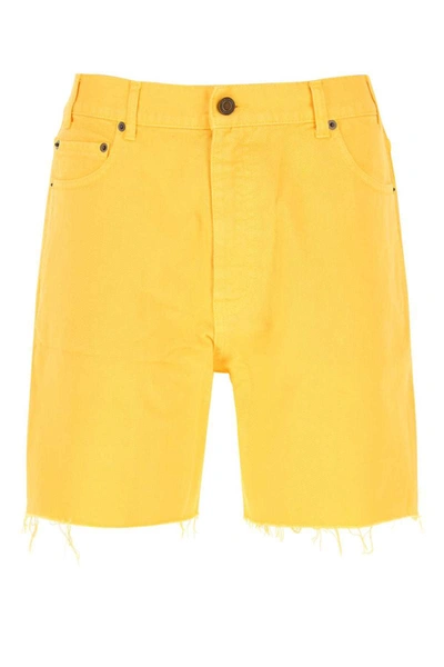 Shop Saint Laurent Shorts In Yellow