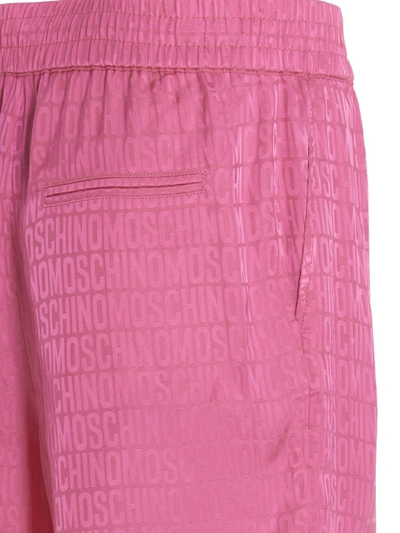 Shop Moschino Monogram Bermuda Shorts In Fuchsia