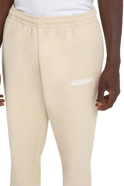 Shop Jacquemus Logo Print Sweatpants In Beige