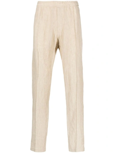 Shop Emporio Armani Linen Trousers In Beige