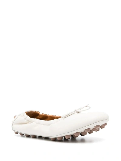 Shop Tod's Bubble Leather Ballt Flats In White