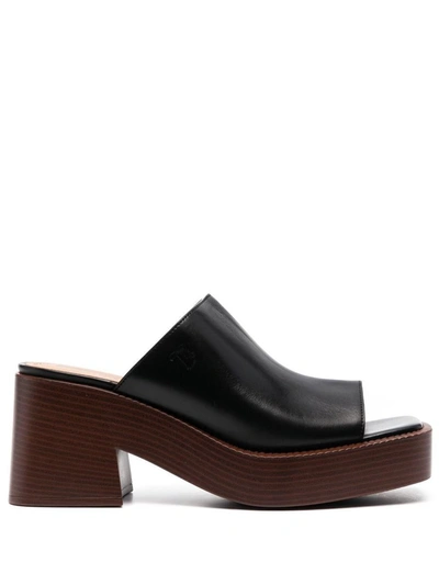 Shop Tod's Leather Mules In Black